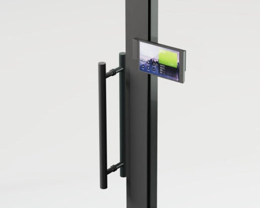 Digital display mounted on a black door handle against a white background
