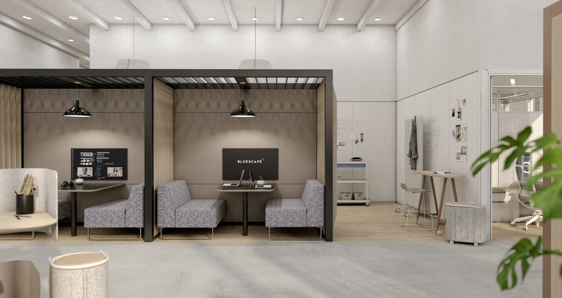 Modern office space with private office pods and a meeting area.