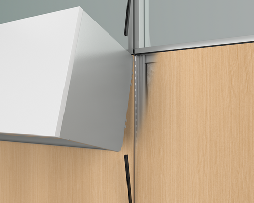 Close-up of a wooden cabinet with a white and gray panel.