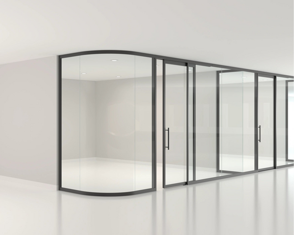 Modern glass office partition in a minimalistic office setting