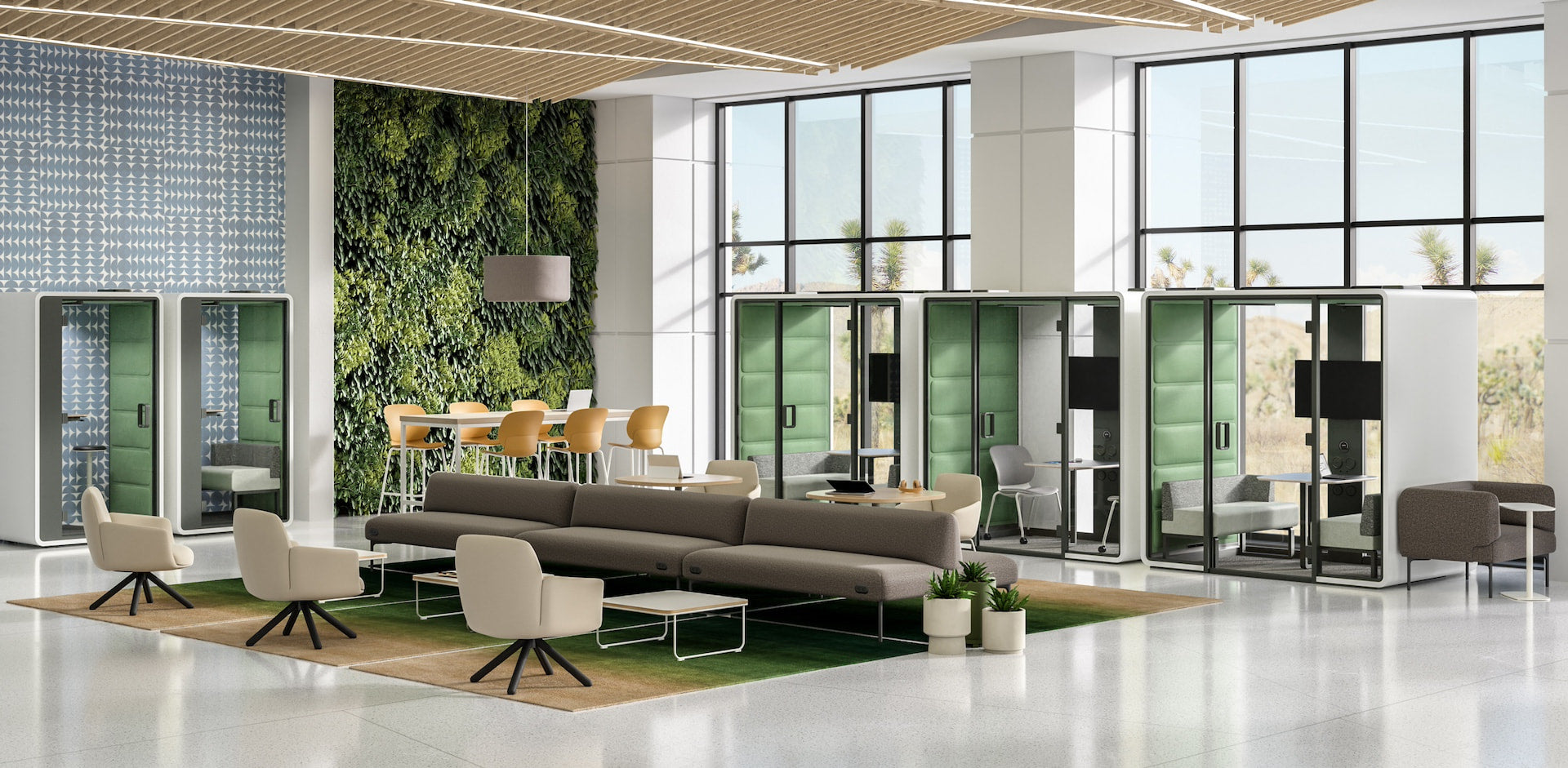 Modern office interior with a large glass wall, greenery, and comfortable seating.