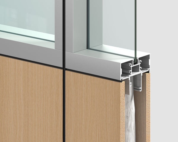 Close-up of a window frame with wooden panel and metal trim on a white background